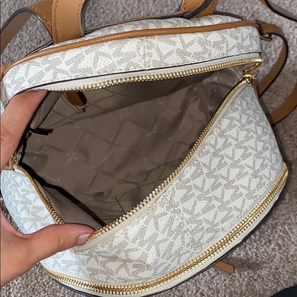 3 zipper Michael Kors backpack